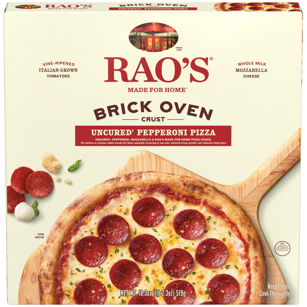 Box of Rao's Brick Oven Crust Uncured Pepperoni Pizza, showing a baked pepperoni pizza with cheese and pepperoni slices. The box features tomatoes, cheese, and parsley on the left side. Frozen pizza brands.