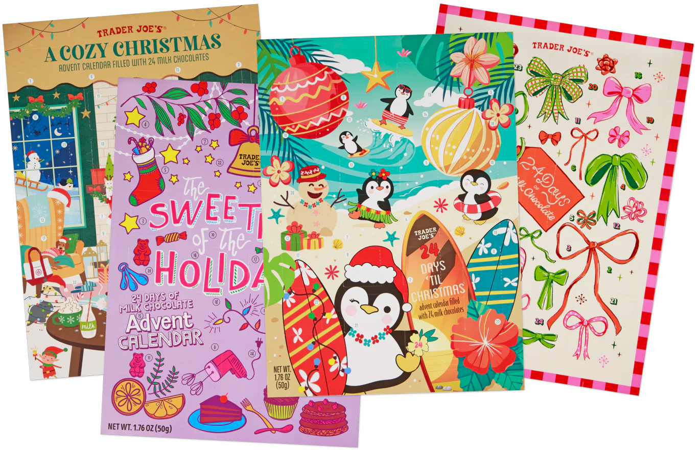 Four colorful Trader Joe’s advent calendars with festive holiday designs, featuring Christmas trees, penguins, ornaments, gifts, and desserts, arranged overlapping each other.