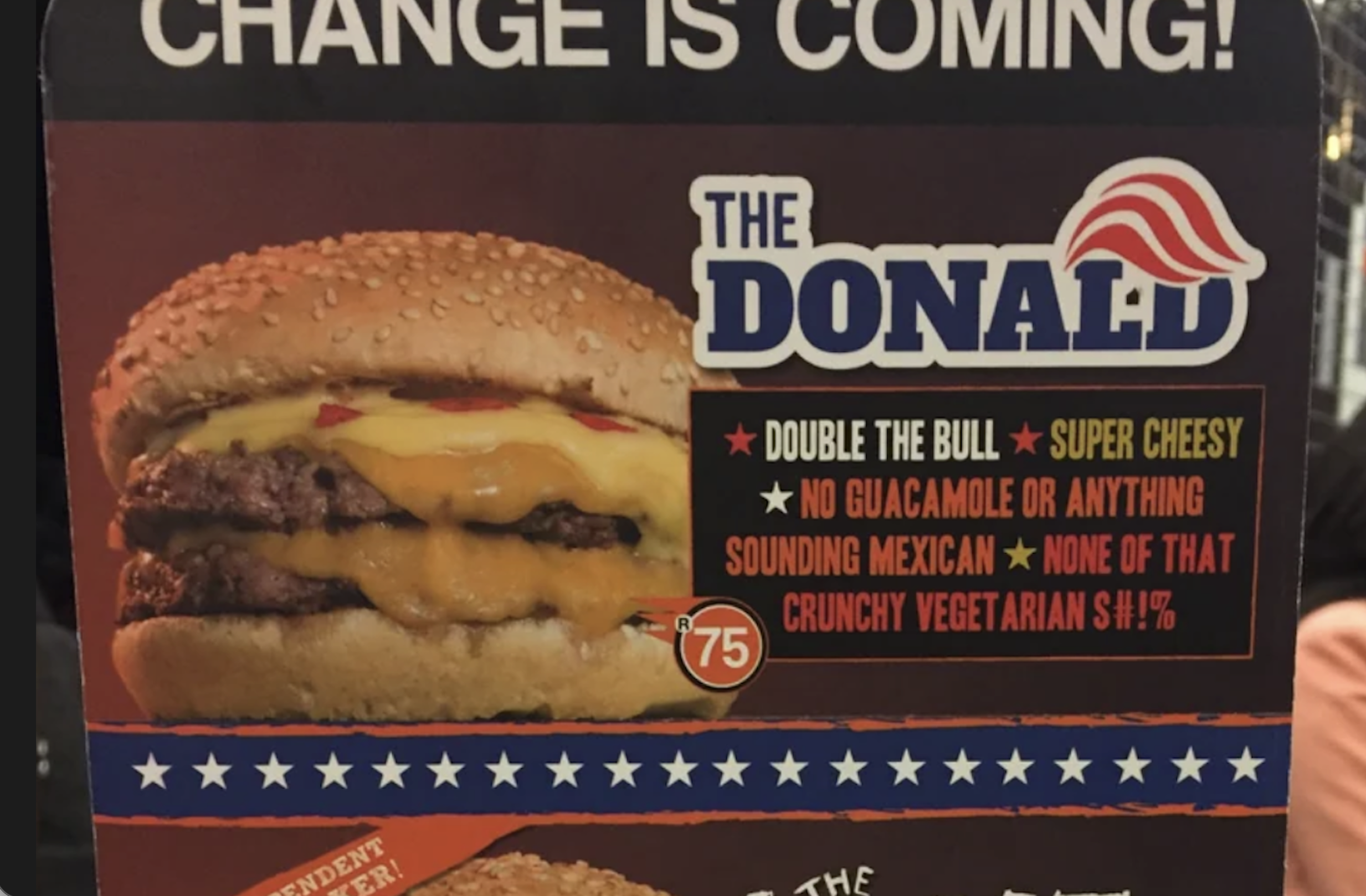 A burger ad labeled “The Donald” with two beef patties, cheese, and text reading “No guacamole or anything sounding Mexican = none of that crunchy vegetarian s#!t.”