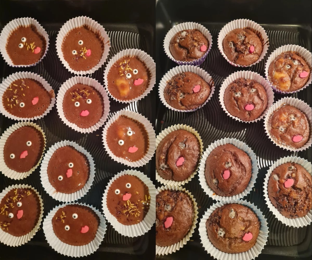 Two sets of chocolate cupcakes: the left batch has playful faces with candy eyes and red lips, while the right batch is undecorated. All cupcakes are in paper liners and arranged on dark trays.