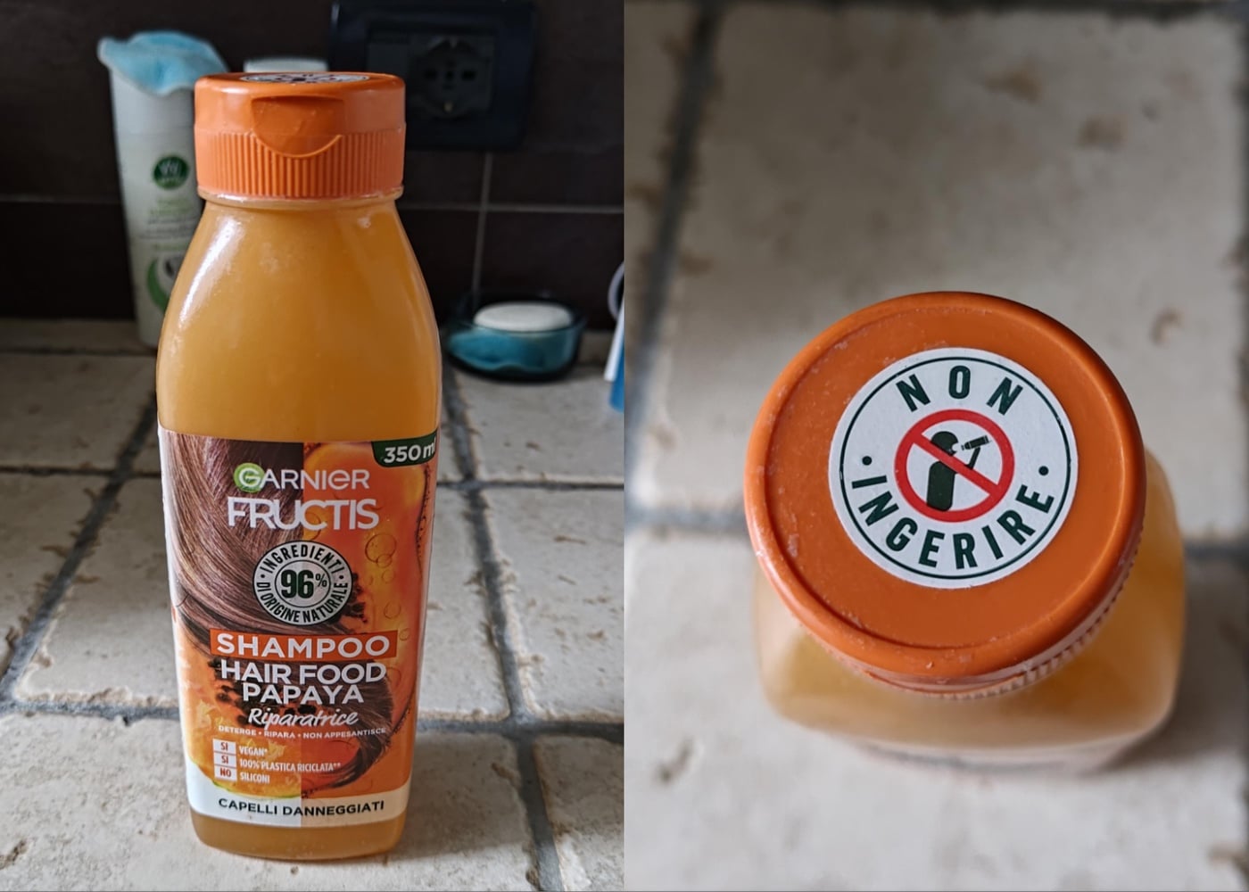 A bottle of Garnier Fructis Papaya Hair Food Shampoo on a tiled surface. The cap displays a warning label stating “NON INGERIRE” with a symbol indicating not to ingest.