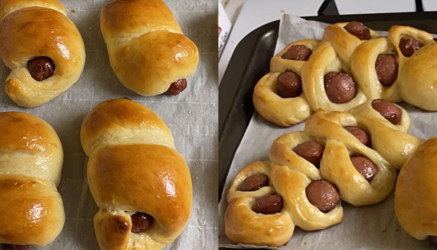 Two types of baked bread rolls filled with sausages: on the left, smooth crescent-shaped rolls, and on the right, twisted rolls with sausage pieces peeking through the dough, both on parchment-lined baking trays.