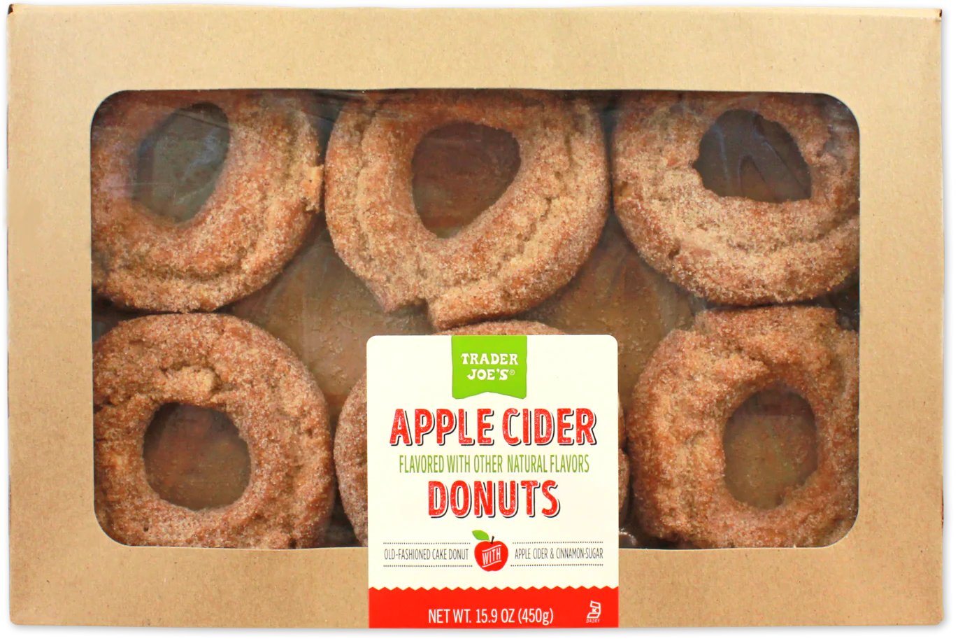 A box of Trader Joe’s Apple Cider Donuts is shown, with six sugar-coated donuts visible through a clear window in the packaging. The label highlights the apple cider flavor and net weight of 15.9 oz (455g).