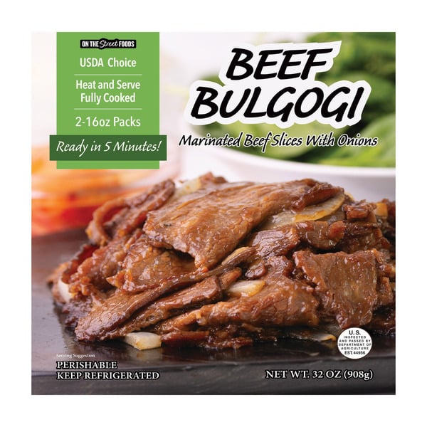 A package of Beef Bulgogi featuring marinated beef slices with onions on a plate. The label highlights it is USDA Choice, fully cooked, ready in 5 minutes, and weighs 32 oz.