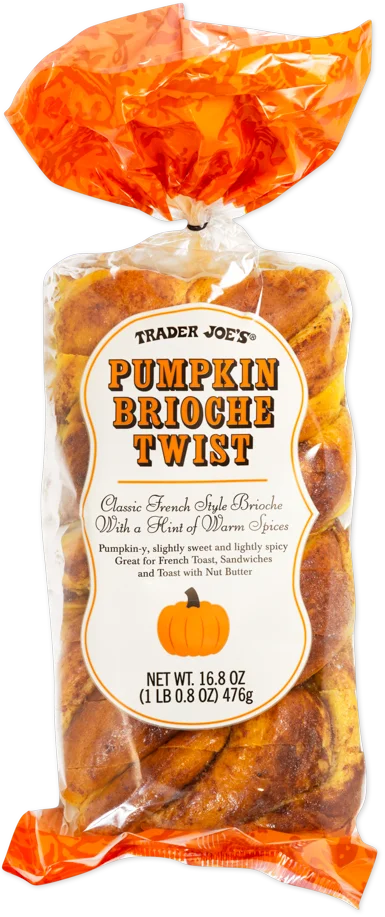 A package of Trader Joe’s Pumpkin Brioche Twist bread in orange and clear plastic, showing the swirled loaf inside. The label highlights pumpkin flavor and that it’s great for toast and sandwiches.