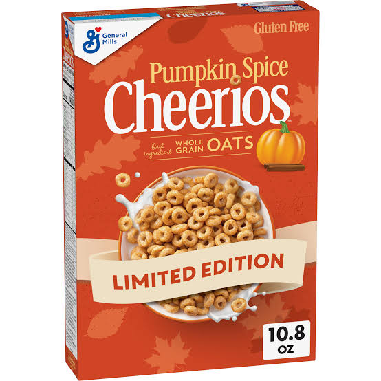 A box of Pumpkin Spice Cheerios cereal, labeled “Limited Edition” and “Gluten Free,” featuring a bowl of cereal with milk and autumn leaf graphics on an orange background. Net weight is 10.8 oz.