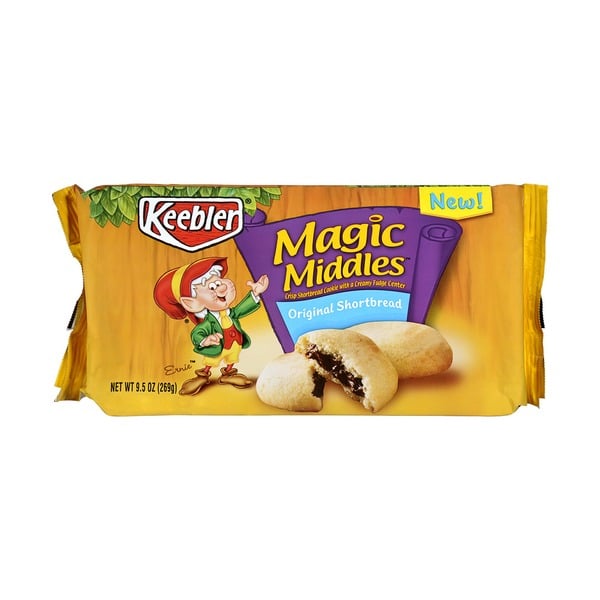 A package of Keebler Magic Middles Original Shortbread cookies, featuring an elf mascot, cookies with chocolate centers, and purple accents on a yellow background.