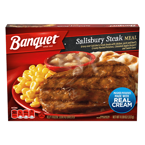 Banquet Salisbury Steak Meal box showing steak with gravy, mashed potatoes, corn, and a dessert. Text highlights “Mashed potatoes made with real cream” and other product details on a red background.
