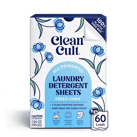 A box of Clean Cult Laundry Detergent Sheets in Fresh Linen scent, featuring blue floral designs, claims of 60 loads, stain-fighting enzymes, and being free from harsh stuff.