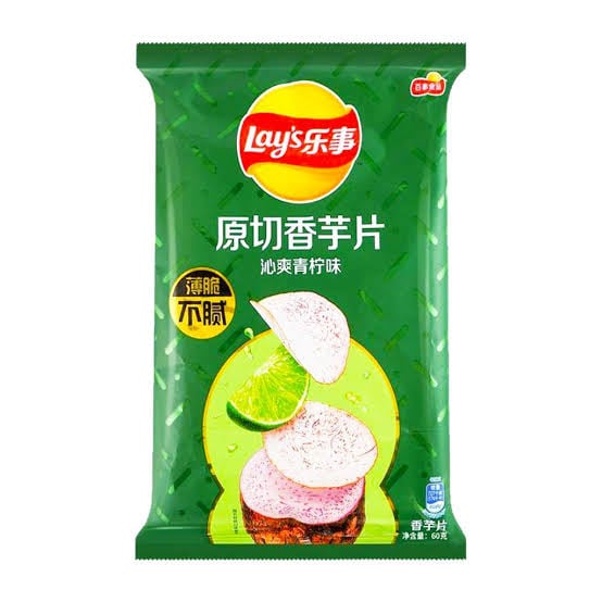 A green bag of Lay’s potato chips with Chinese text, showing sliced taro chips and a lime on the front.