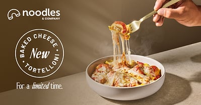 A hand lifts cheesy tortelloni with a fork from a white bowl. Text highlights “Noodles & Company” and “New Baked Cheese Tortelloni.” There’s also a note: “For a limited time.”