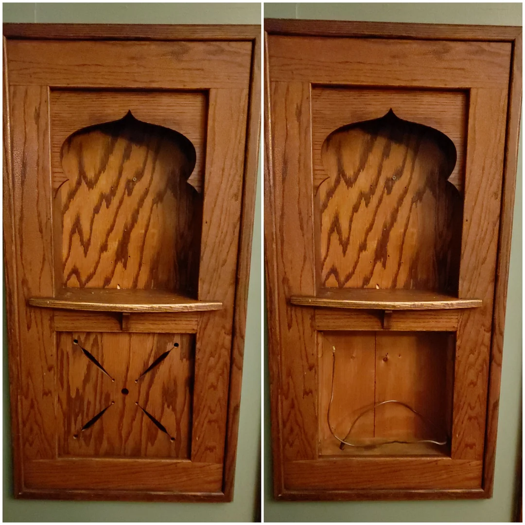 Two side-by-side photos of a wooden recessed wall cabinet with an arched opening; one shows a small shelf inside, the other has the shelf down, revealing cords and an empty lower section.