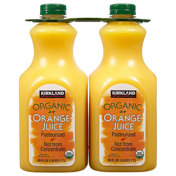 Two 59 fl oz bottles of Kirkland Organic Orange Juice, labeled “Pasteurized” and “Not from Concentrate,” are packaged together with green caps and a green connecting handle on top.