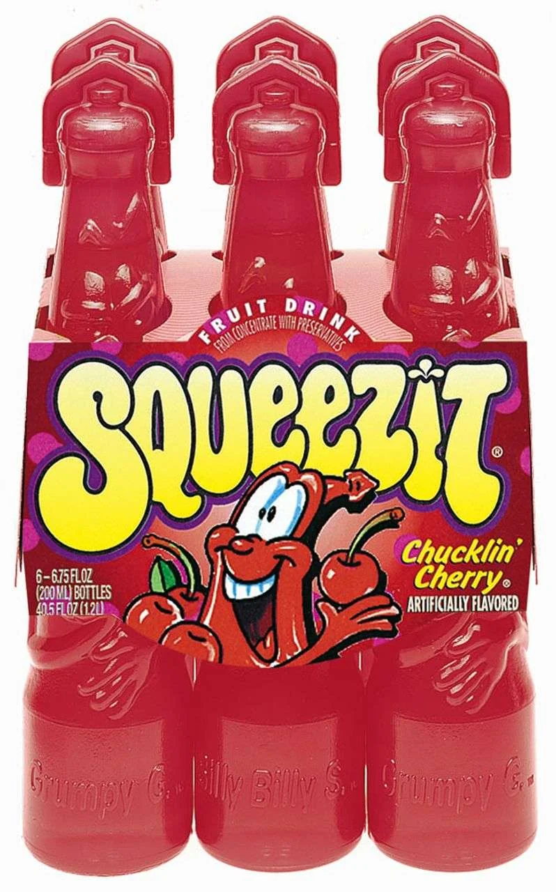 Six bright red Squeezit bottles in a pack, labeled “Chucklin’ Cherry” with a cartoon cherry character and bold yellow “Squeezit” logo on the purple cardboard packaging.