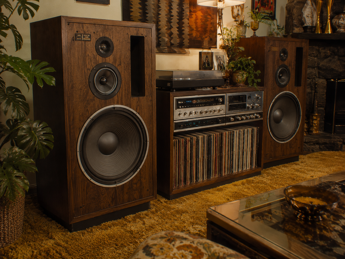 A vintage stereo system with large wooden speakers, a record player, and vinyl records is arranged on a shelf in a cozy room with retro decor, plants, and textured carpet.