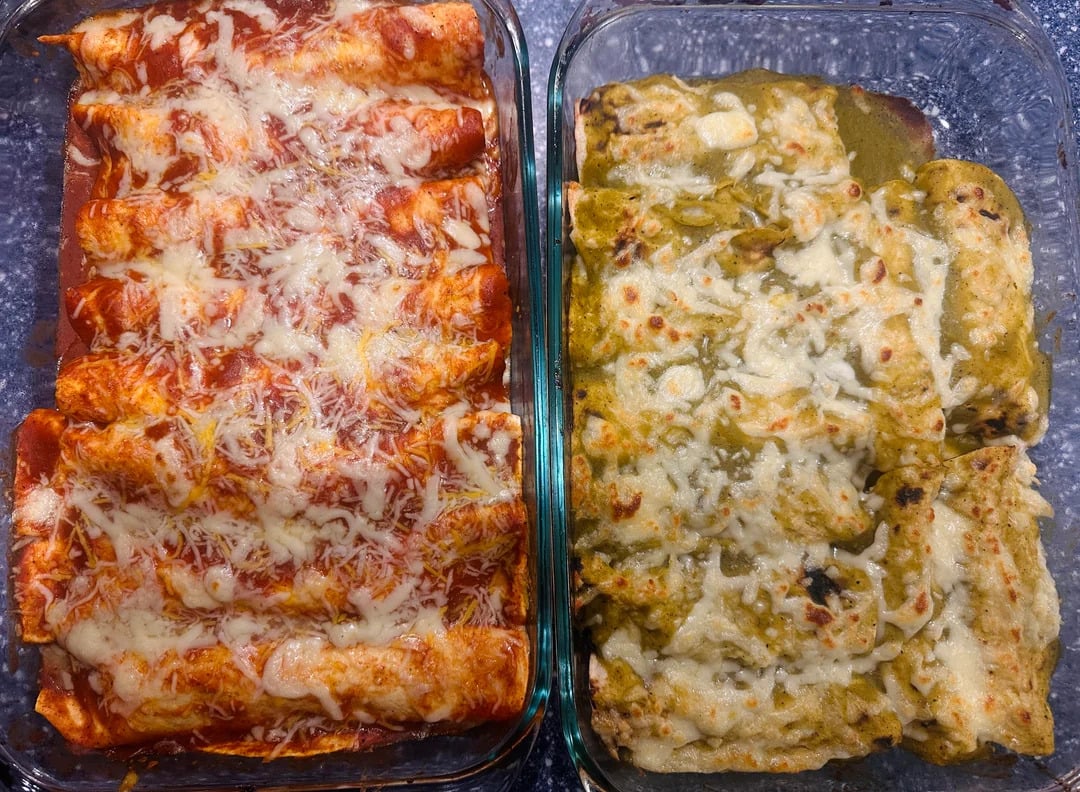 Two glass baking dishes: one with red sauce cheese enchiladas on the left, and one with green sauce cheese enchiladas on the right, both topped with melted cheese.