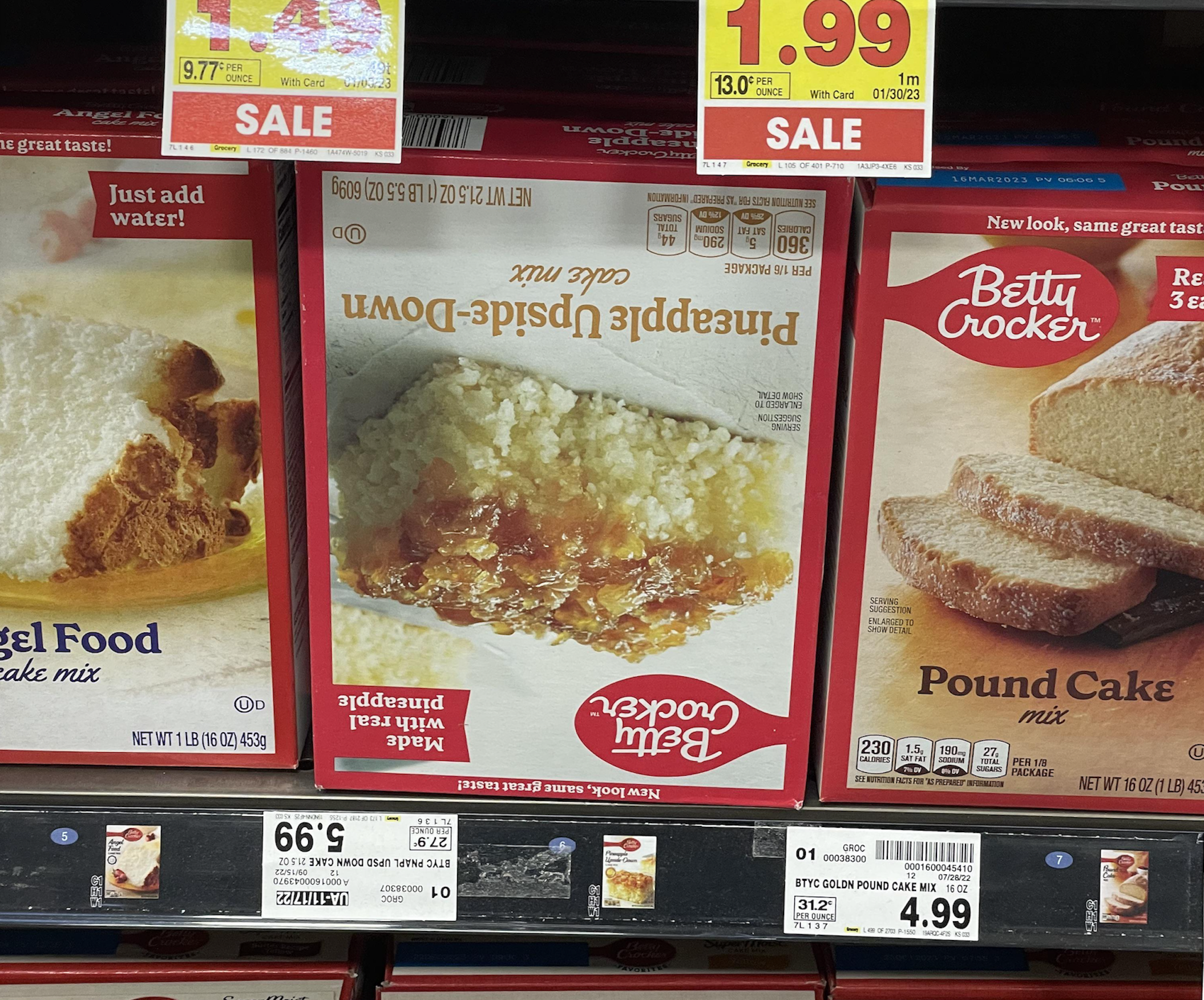 Betty Crocker cake mix boxes on a store shelf, featuring Pineapple Upside-Down, Angel Food, and Pound Cake varieties with price tags above.