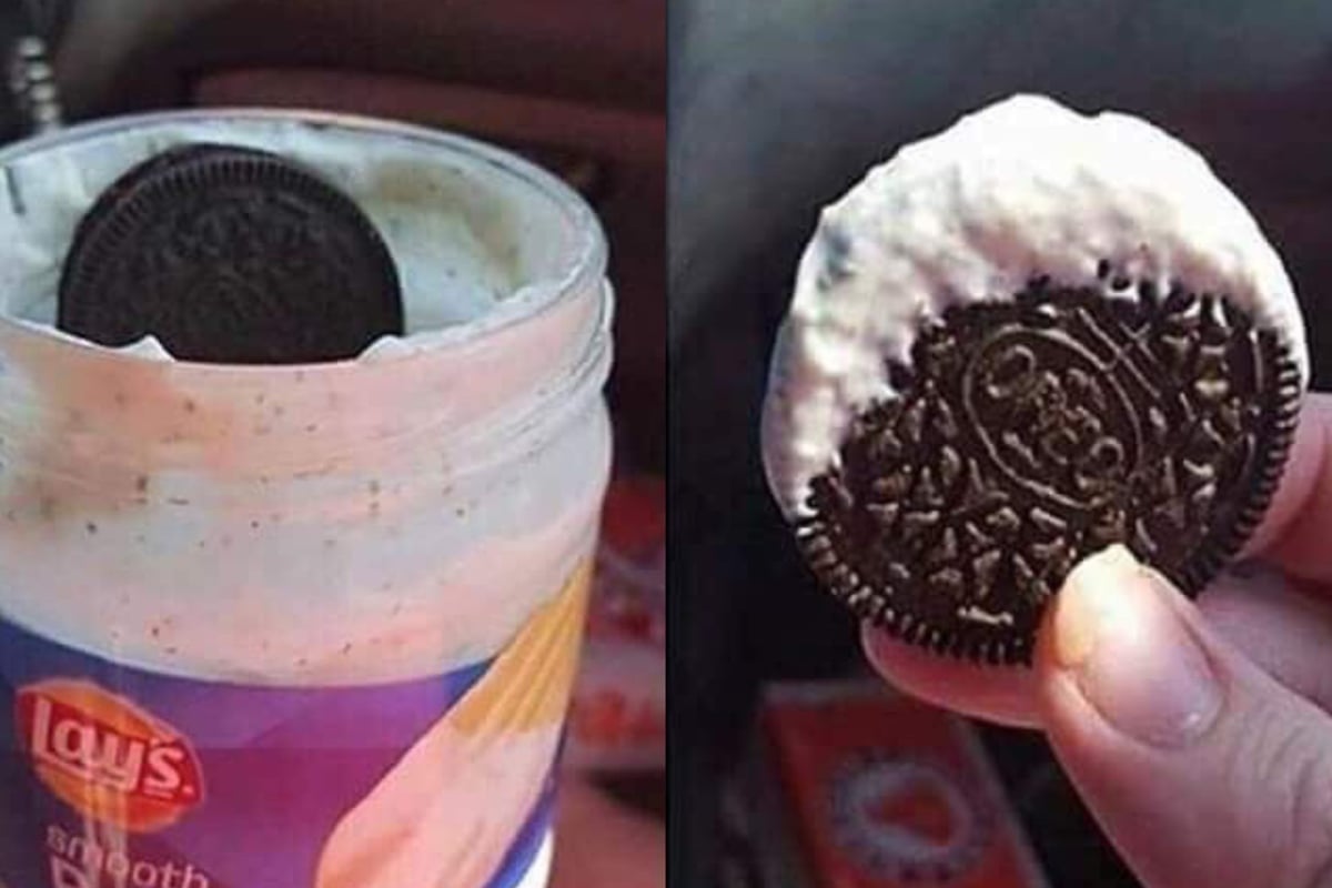 An Oreo cookie dipped into a jar of Lay’s French onion dip.