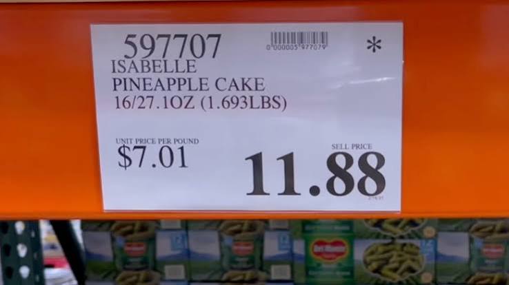 Store shelf sign for Isabelle Pineapple Cake, priced at $11.88 with a unit price of $7.01 per pound.