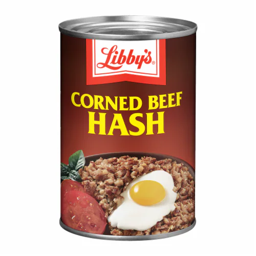 A can of Libby’s Corned Beef Hash with an image of hash, a fried egg, and tomato slices on the label.