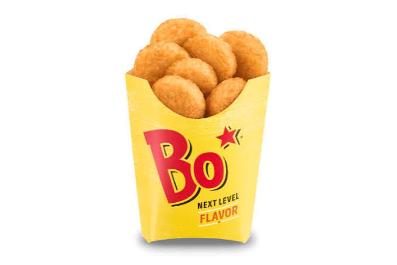 A yellow carton of Bojangles’ golden-brown fried potato rounds.