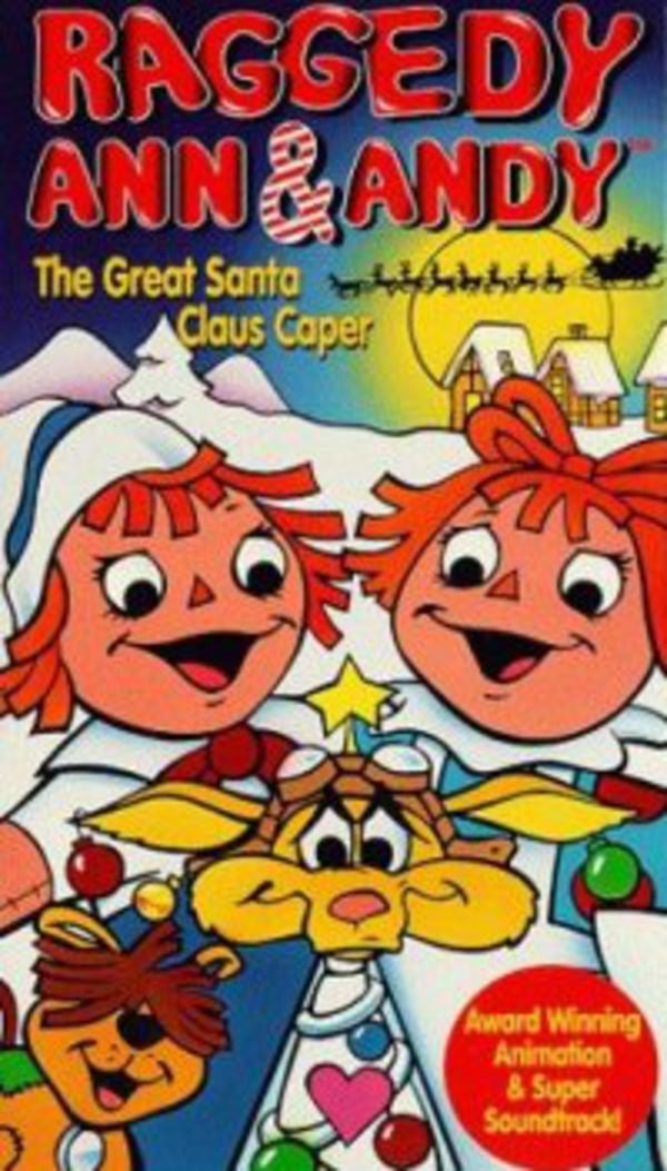 VHS cover for “Raggedy Ann & Andy: The Great Santa Claus Caper,” featuring the characters in front of a snowy village and a silhouette of a sleigh.