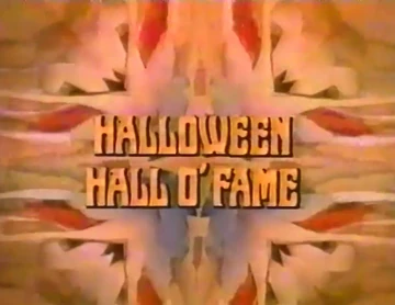 The text “HALLOWEEN HALL O’ FAME” displayed over a symmetrical, abstract orange and red background.