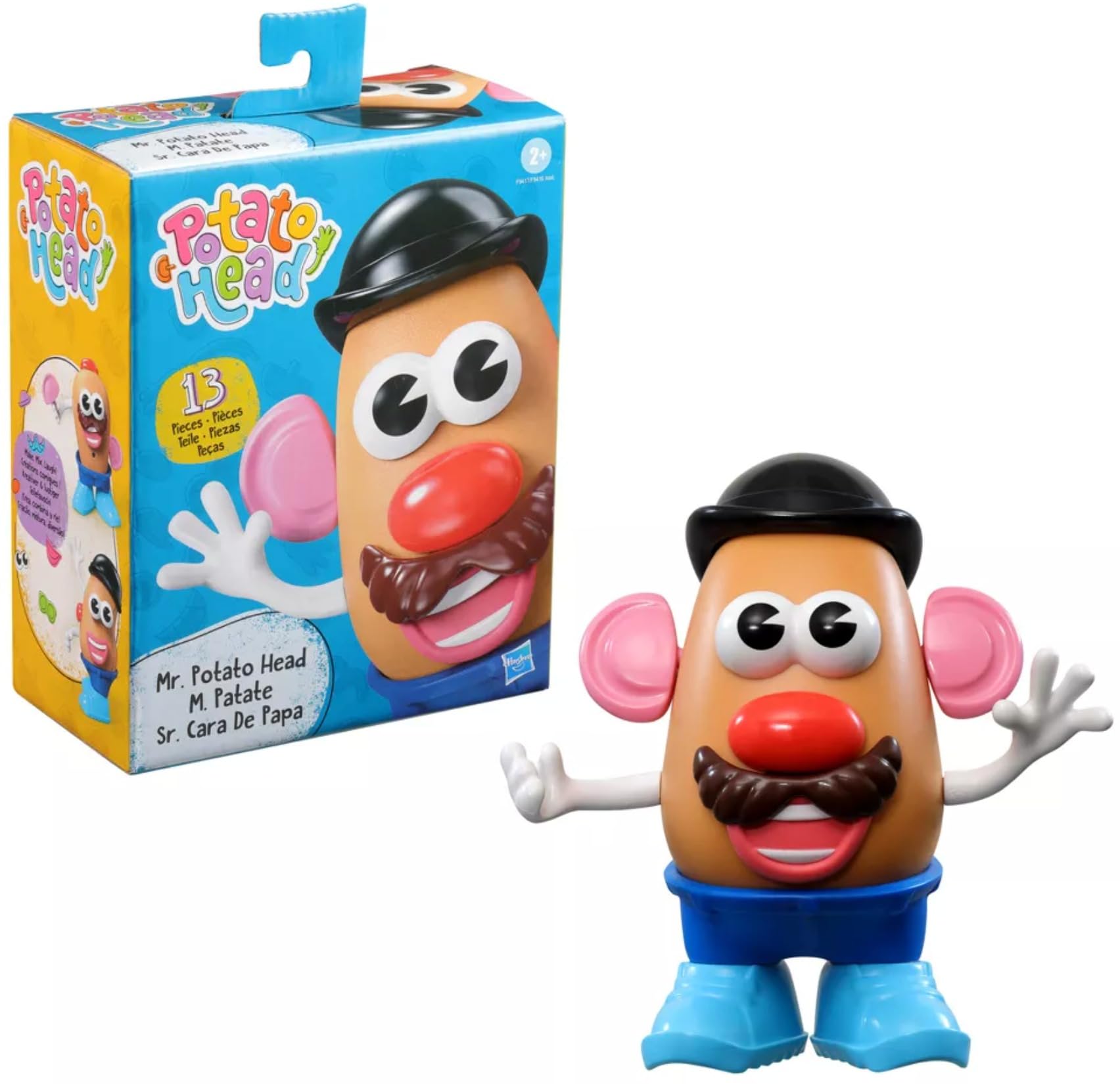 Mr. Potato Head toy with a black hat, mustache, and blue shoes, displayed next to its product packaging.